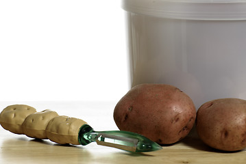 Image showing Peeling Potatoes