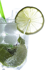 Image showing Ice cubes in mojito cocktail glass