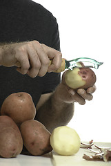 Image showing Closeup Peeling Potato