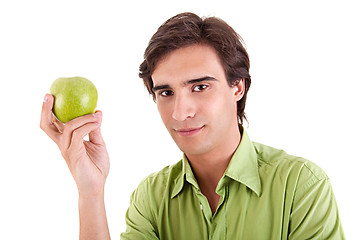 Image showing man eating a green apple