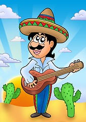 Image showing Mexican musician with sunset