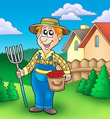 Image showing Cartoon farmer on garden