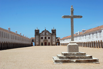 Image showing Big cross with church in the background