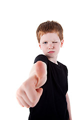 Image showing Portrait of a cute young boy, with thumb up