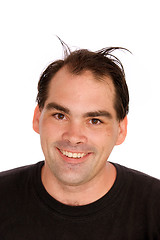 Image showing smiling man with funny hairdo