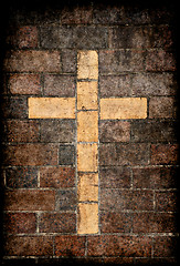 Image showing christian cross in brick wall