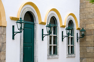 Image showing Facade of windows and antique lanterns