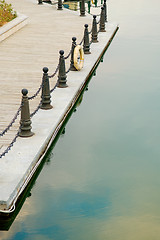 Image showing Line of railing post