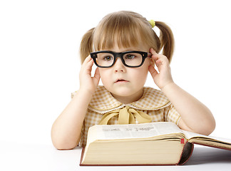 Image showing Cute little girl with book, back to school