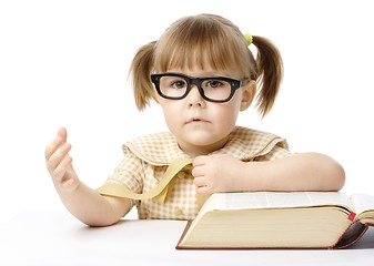 Image showing Cute little girl with book, back to school