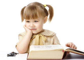 Image showing Cute little girl with book, back to school