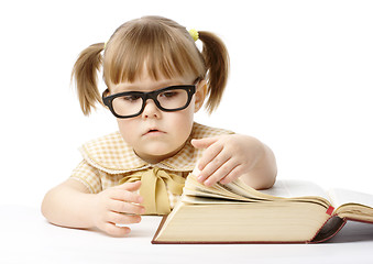 Image showing Cute little girl with book, back to school