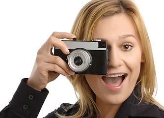 Image showing young woman taking a shot with photo camera