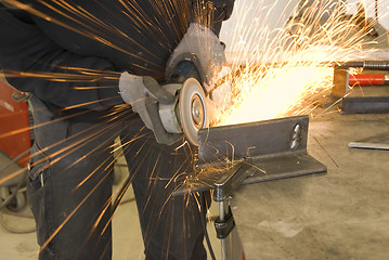 Image showing steel worker grinder