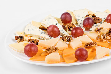 Image showing Cheese and grapes and nuts