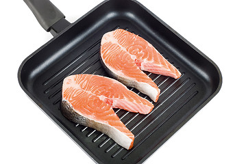 Image showing trout steak at grill pan