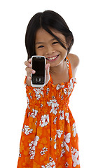Image showing cute girl showing her cellular phone