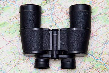 Image showing Binoculars and map