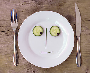 Image showing Vegetable Face on Plate - Male, Sceptical