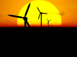 Image showing Wind turbines at sunset