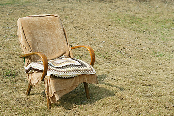 Image showing old-fashioned garden chair and pillow