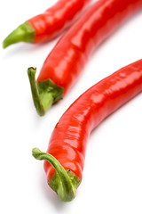 Image showing three red chili peppers