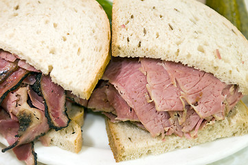 Image showing combination pastrami corned beef on rye sandwich