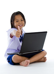 Image showing schoolgirl with laptop and thumb up