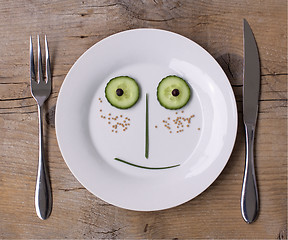 Image showing Vegetable Face on Plate - Male, Happy