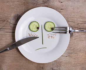 Image showing Vegetable Face on Plate - Male, Unhappy