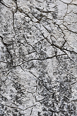 Image showing close up texture of grey stone with cracks