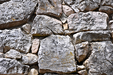 Image showing close up texture of grey stone with cracks