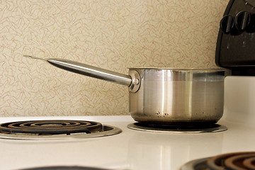 Image showing pan on old stove