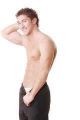 Image showing Smiling guy demonstrates torso