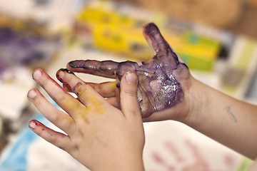 Image showing Little Children Hands doing Fingerpainting