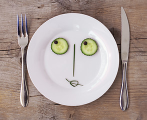 Image showing Vegetable Face on Plate - Female, Flirting