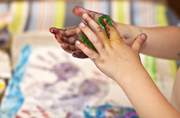 Image showing Little Children Hands doing Fingerpainting