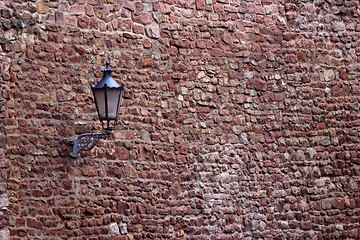 Image showing Part of the old city wall with lantern in Ladenburg, Germany