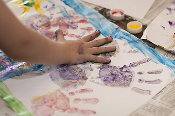 Image showing Little Children Hands doing Fingerpainting