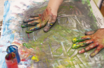 Image showing Little Children Hands doing Fingerpainting