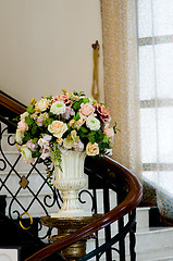 Image showing Flowers on the stairs