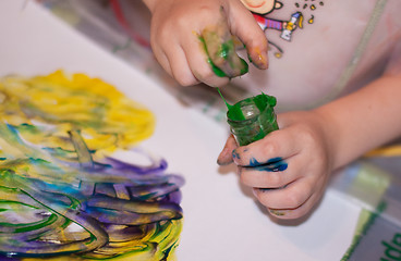 Image showing Little Children Hands doing Fingerpainting