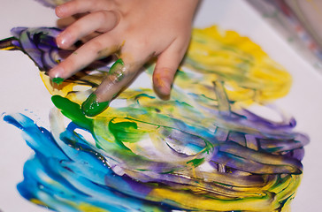 Image showing Little Children Hands doing Fingerpainting