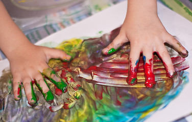 Image showing Little Children Hands doing Fingerpainting