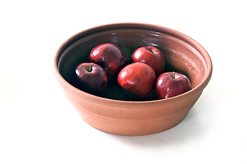 Image showing ceramic bowl of apples on white