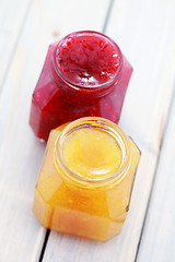 Image showing orange and raspberry jam