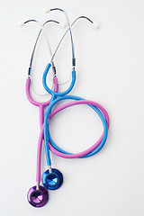 Image showing pink and blue stethoscopes