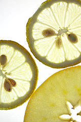 Image showing Sliced Lemon and Apple isolated on white