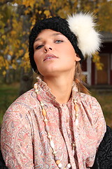 Image showing Young woman in retro clothing