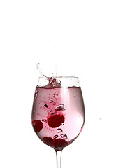 Image showing Fruit falling in a glass